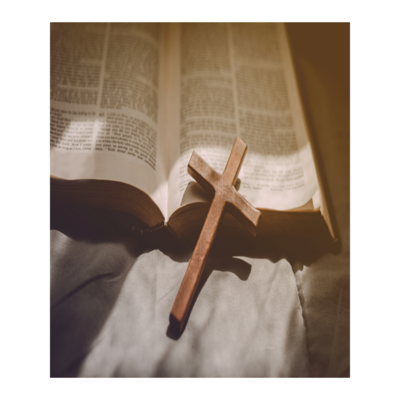open Bible with cross