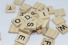 Wooden square tiles with letters